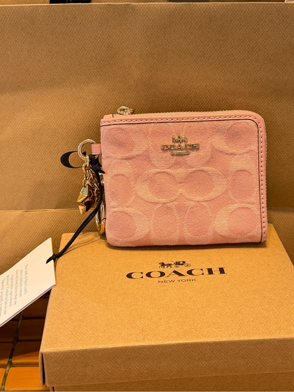 Coach Pink Signature Zip-Around Coin Wallet with Charm